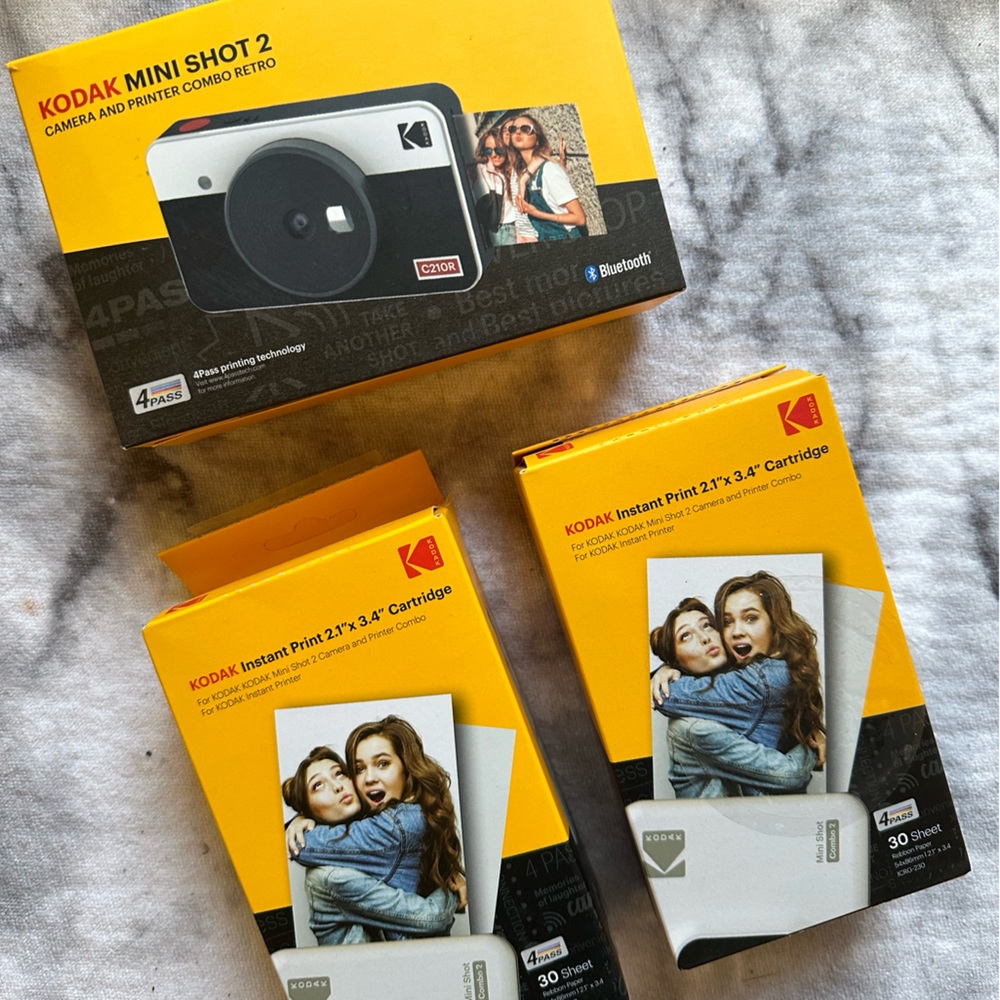 Used to take x2 photos from film. Needed bigger camera and film for scrapbook.